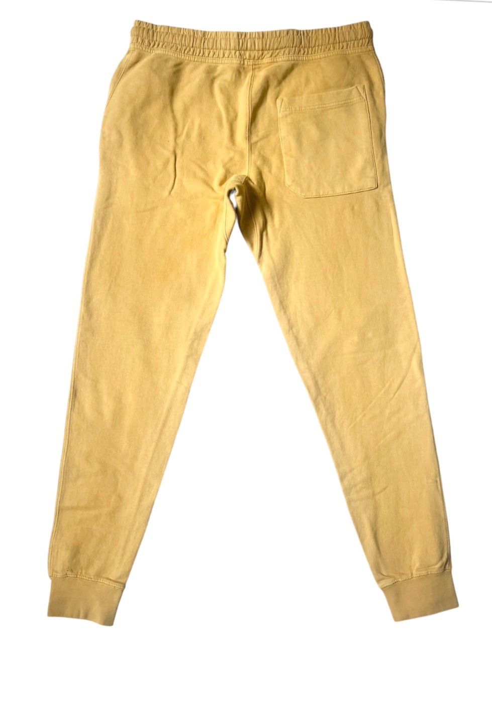 Back view of the vintage mustard signature style joggers with a right side square pocket 