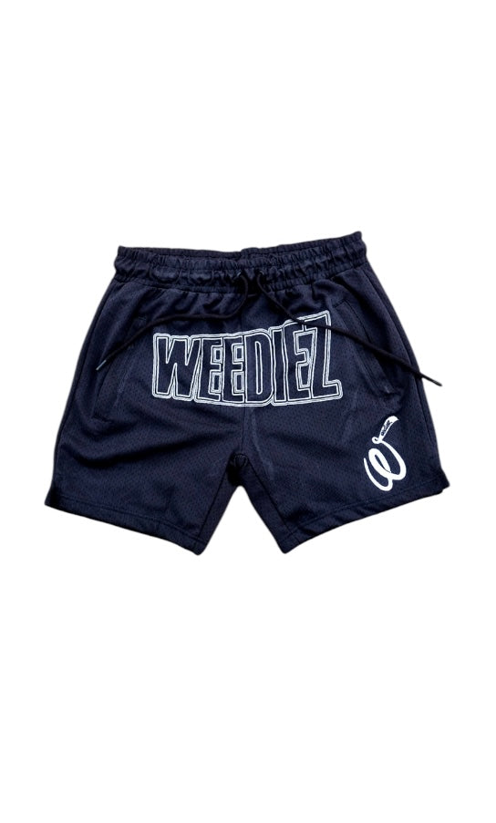 Front view of the basketball shorts with white weediez logo on center and embroidered “w” on left side leg